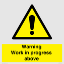 gender-neutral-construction-warning-sign-warning-work-in-progress-above-with-exc~